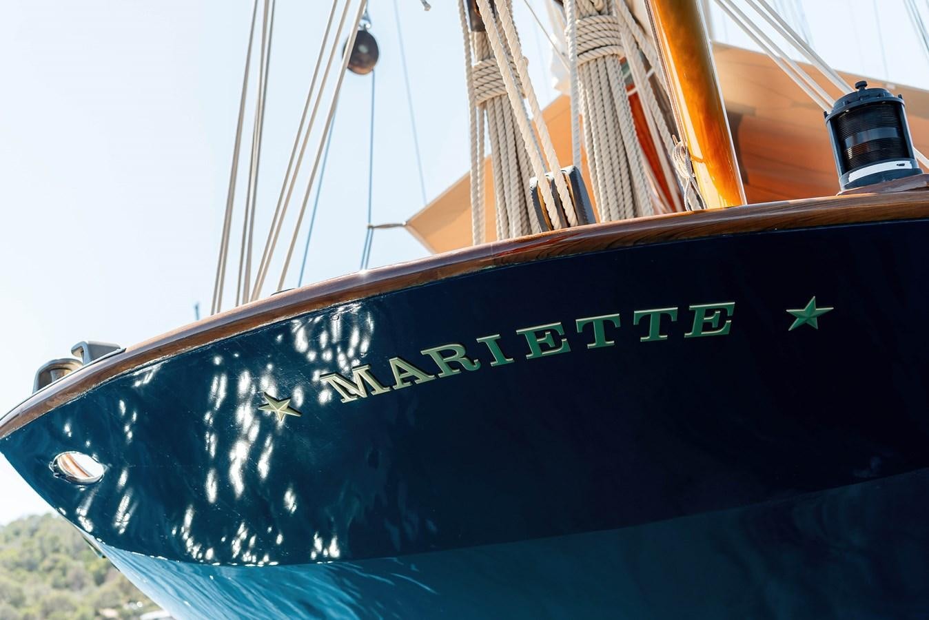 a boat with a sign on the front aboard MARIETTE OF 1915 Yacht for Sale