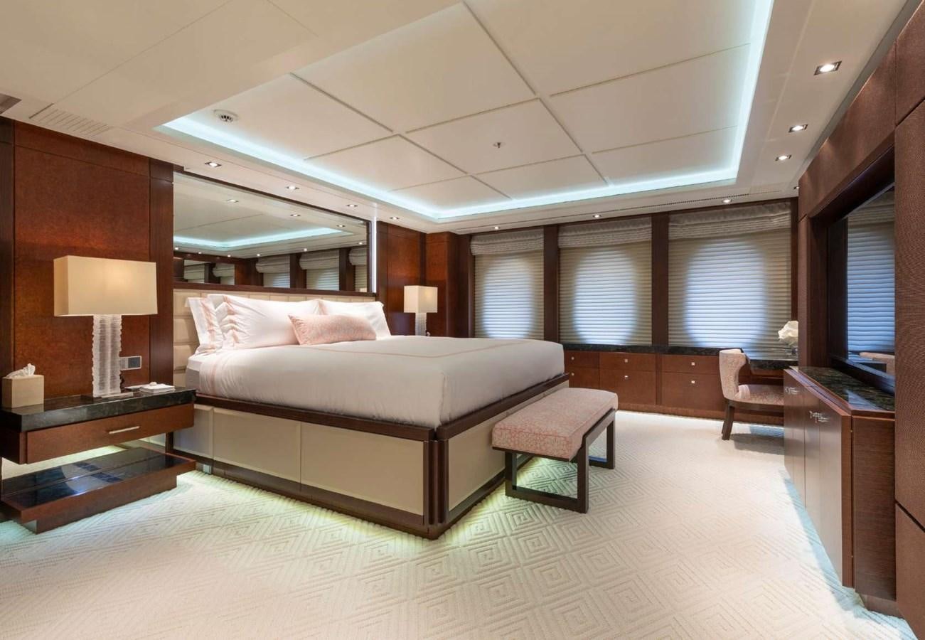 a large bedroom with a large bed aboard BELLA VITA Yacht for Sale
