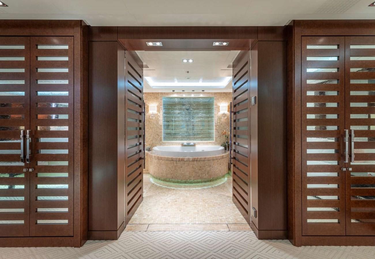 a room with a large glass shower aboard BELLA VITA Yacht for Sale