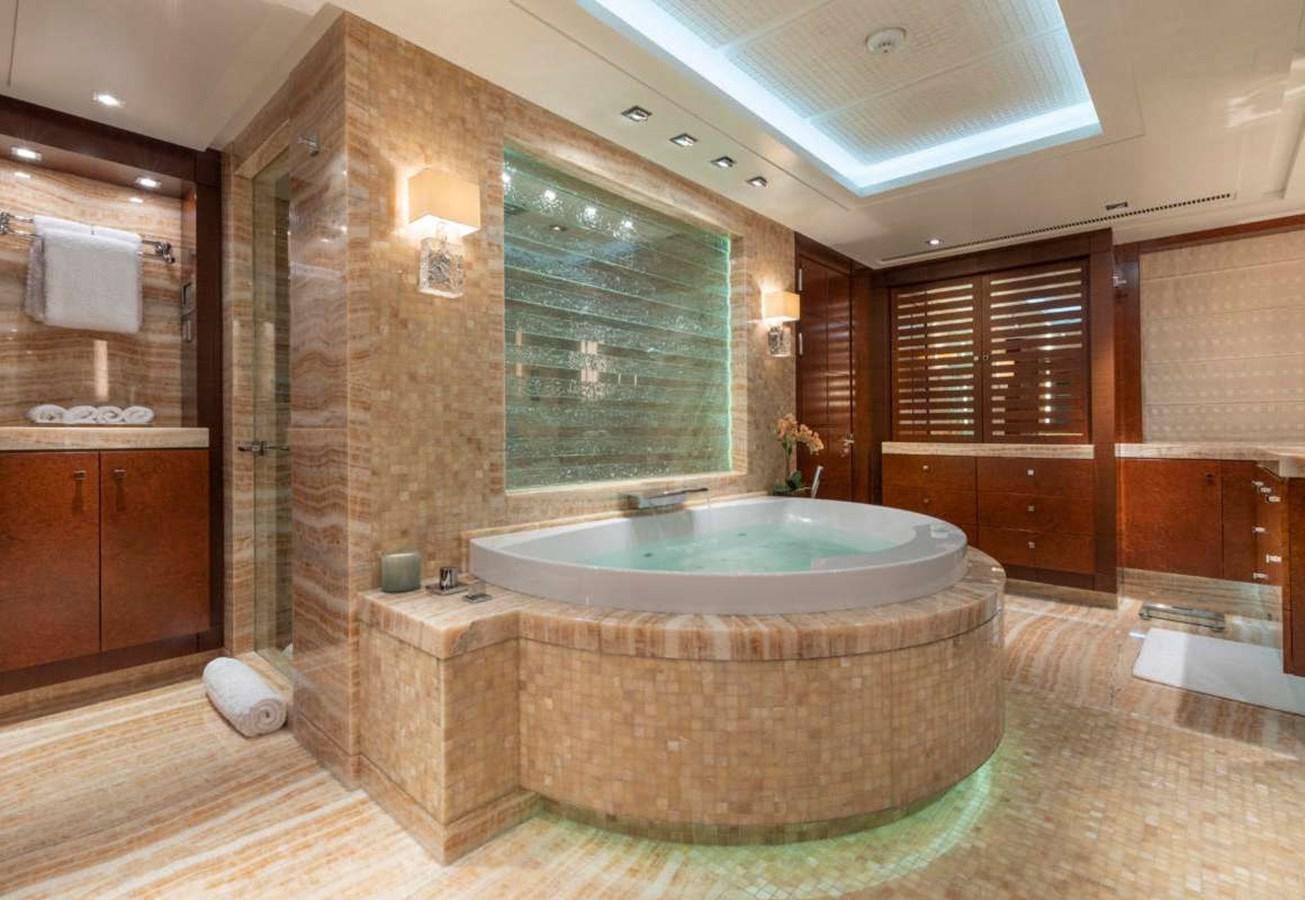a bathroom with a large jacuzzi tub aboard BELLA VITA Yacht for Sale