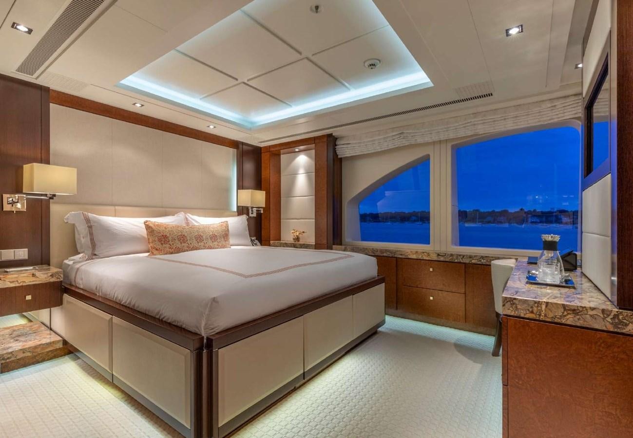 a large bedroom with a large bed aboard BELLA VITA Yacht for Sale