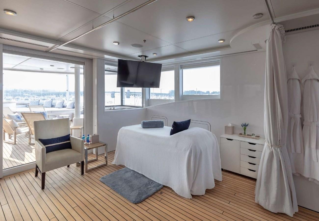 a bedroom with a large bed aboard BELLA VITA Yacht for Sale
