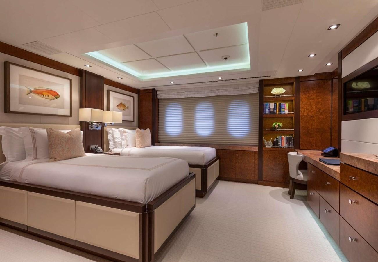 a bedroom with a large bed aboard BELLA VITA Yacht for Sale