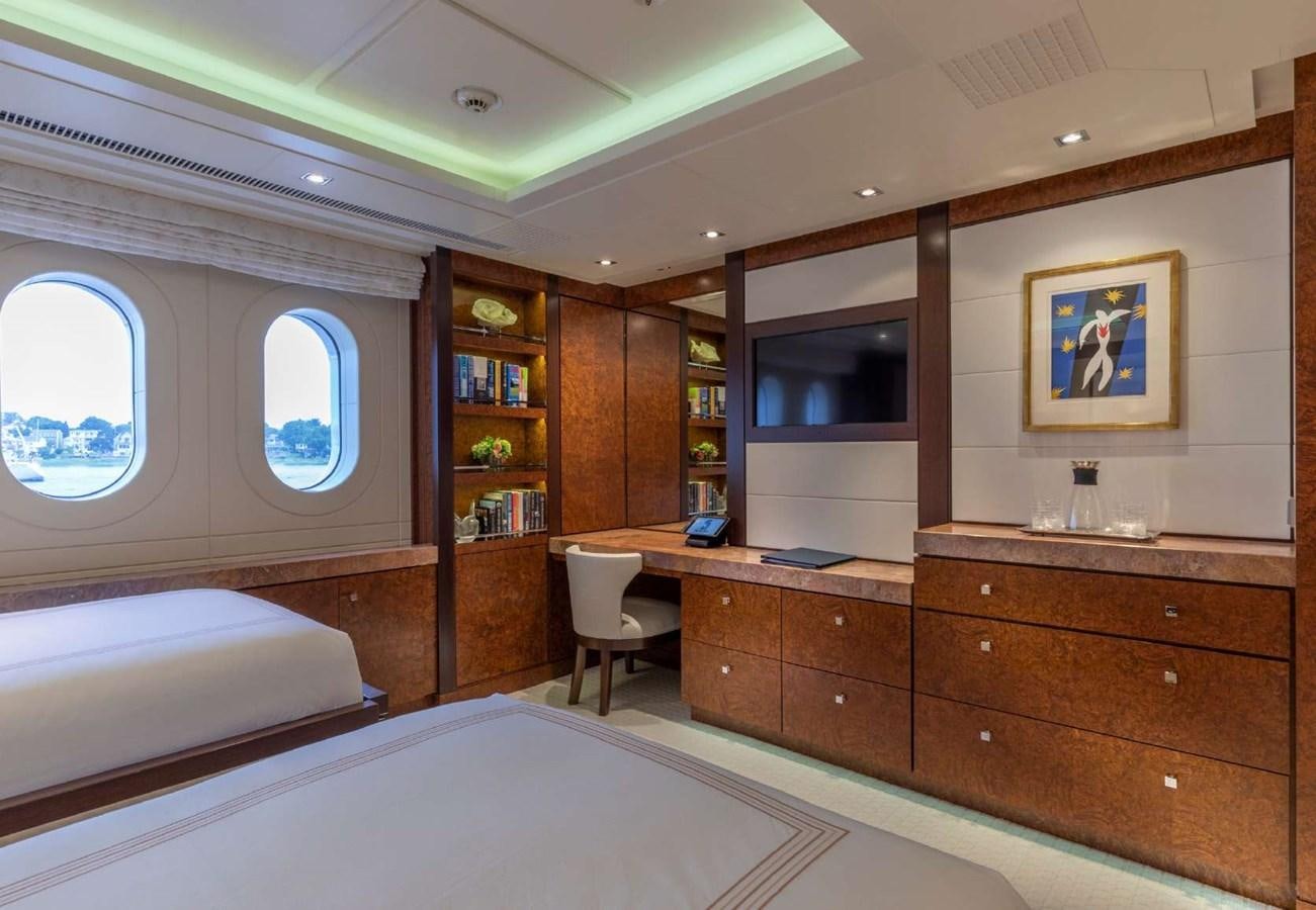 a room with a bed and a window aboard BELLA VITA Yacht for Sale