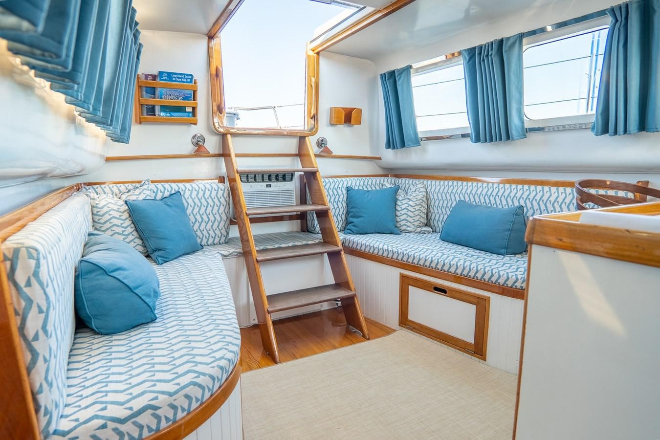 a room with a bed and a bunk bed aboard PIAFFE Yacht for Sale