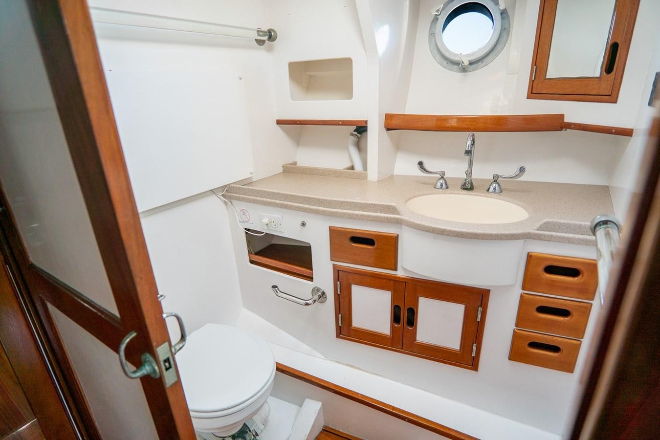 a bathroom with a sink and a toilet aboard PIAFFE Yacht for Sale