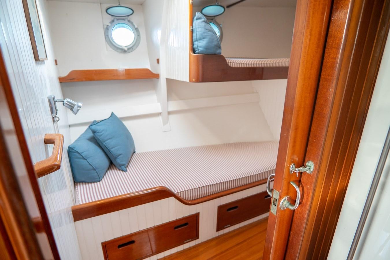 a bathroom with a large mirror aboard PIAFFE Yacht for Sale