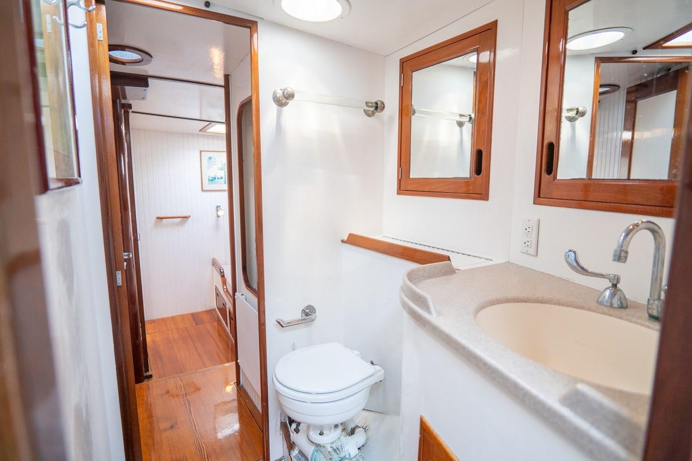 a bathroom with a sink toilet and a shower aboard PIAFFE Yacht for Sale