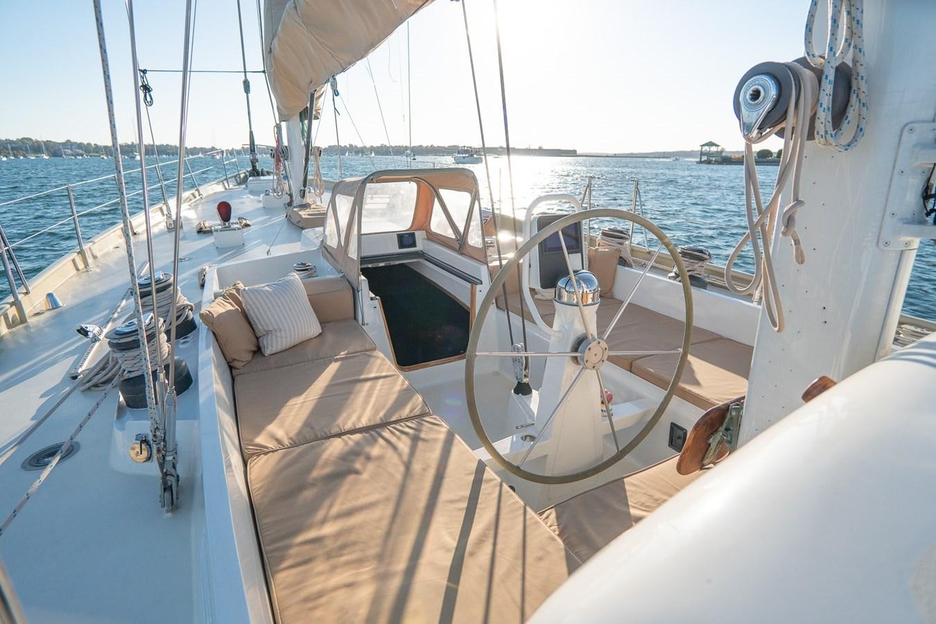 a boat with a large sail aboard PIAFFE Yacht for Sale