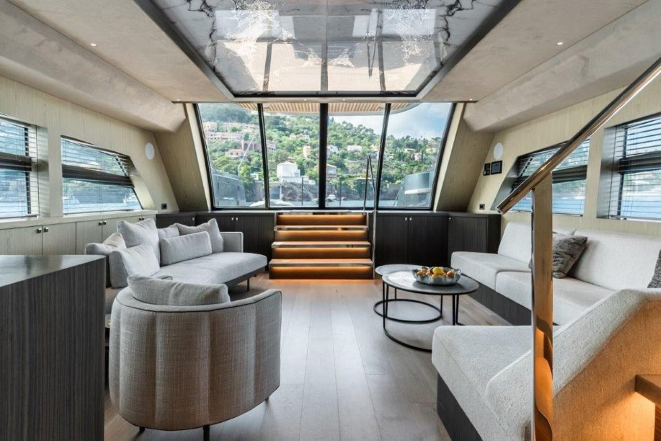 a living room with a large window aboard ST. BARTH Yacht for Sale