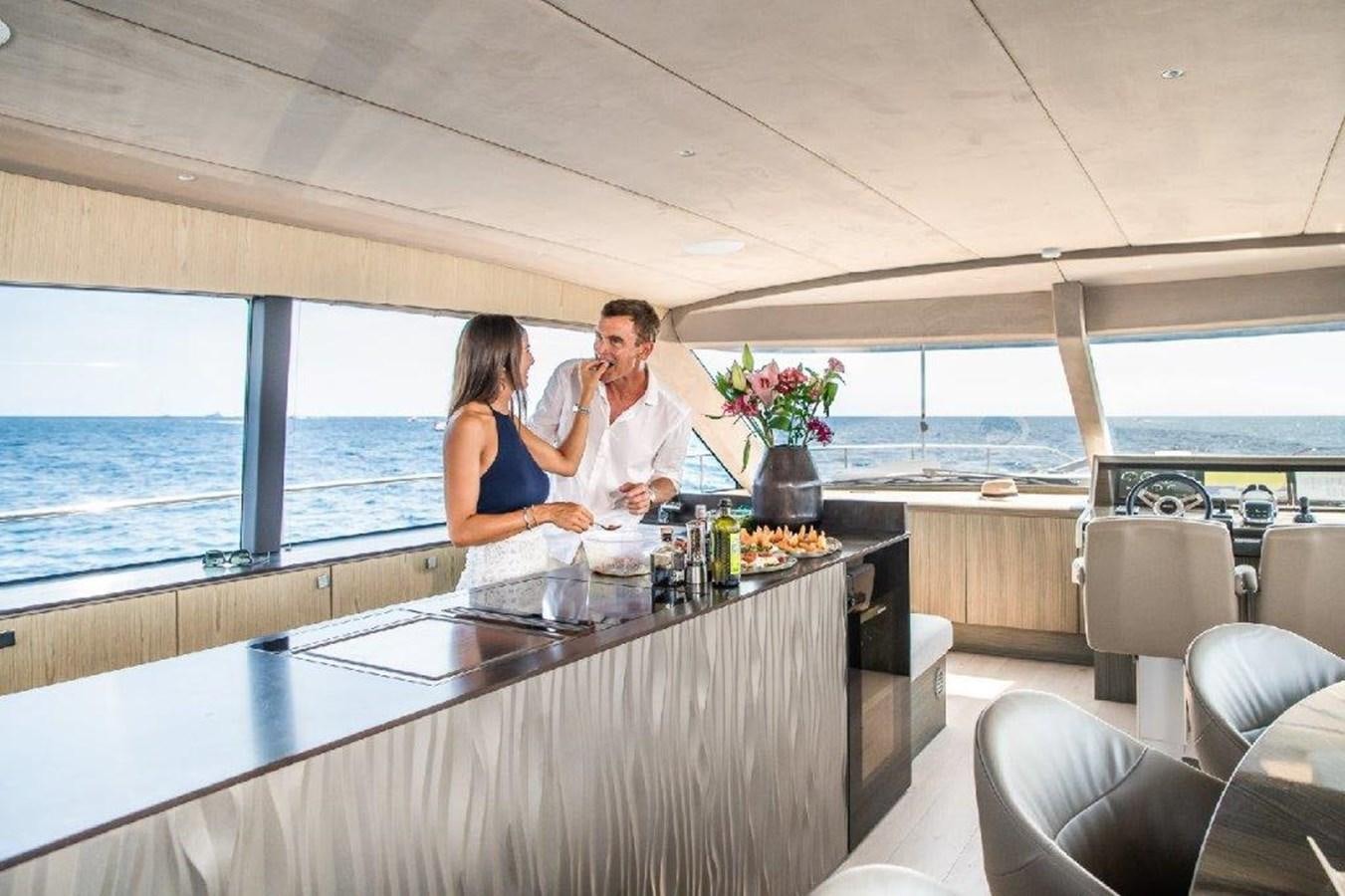 a man and a woman in a restaurant aboard ST. BARTH Yacht for Sale