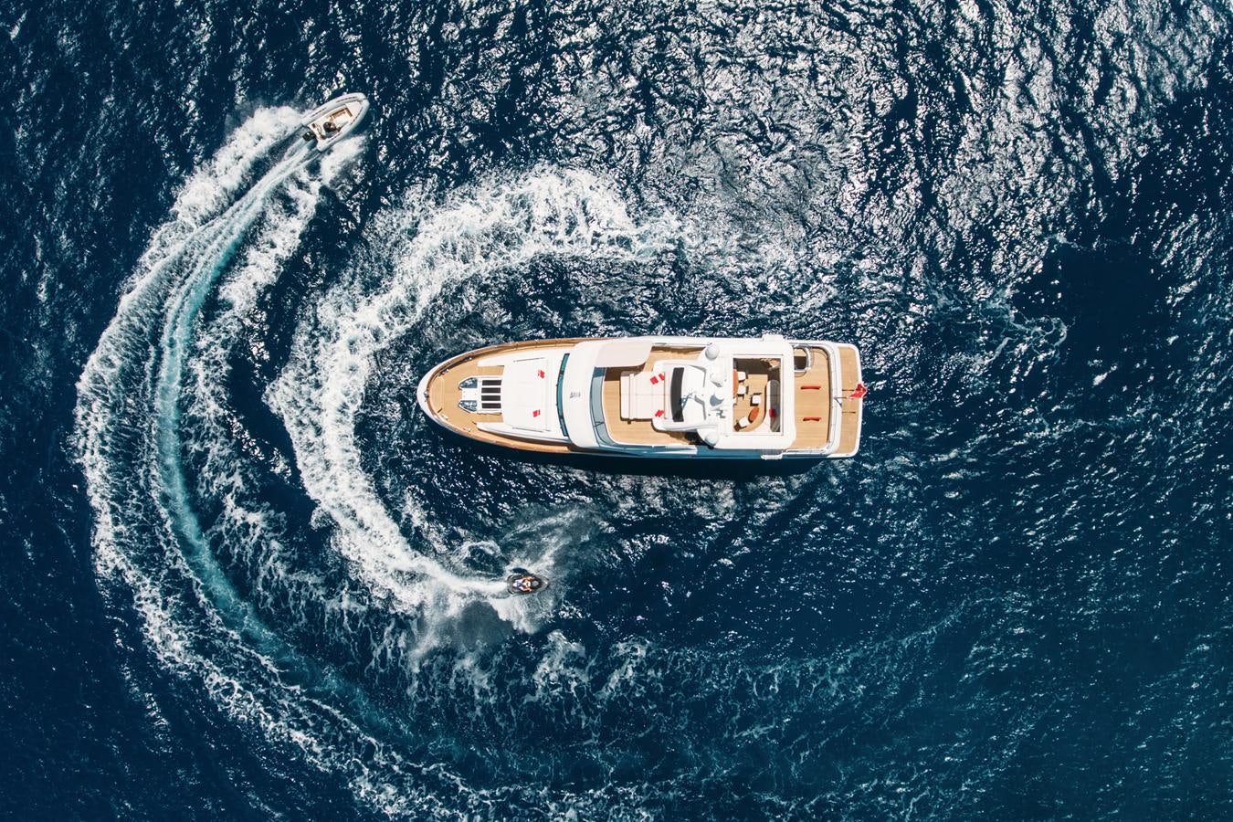 a white and red sign in the water aboard REBECCA V Yacht for Sale