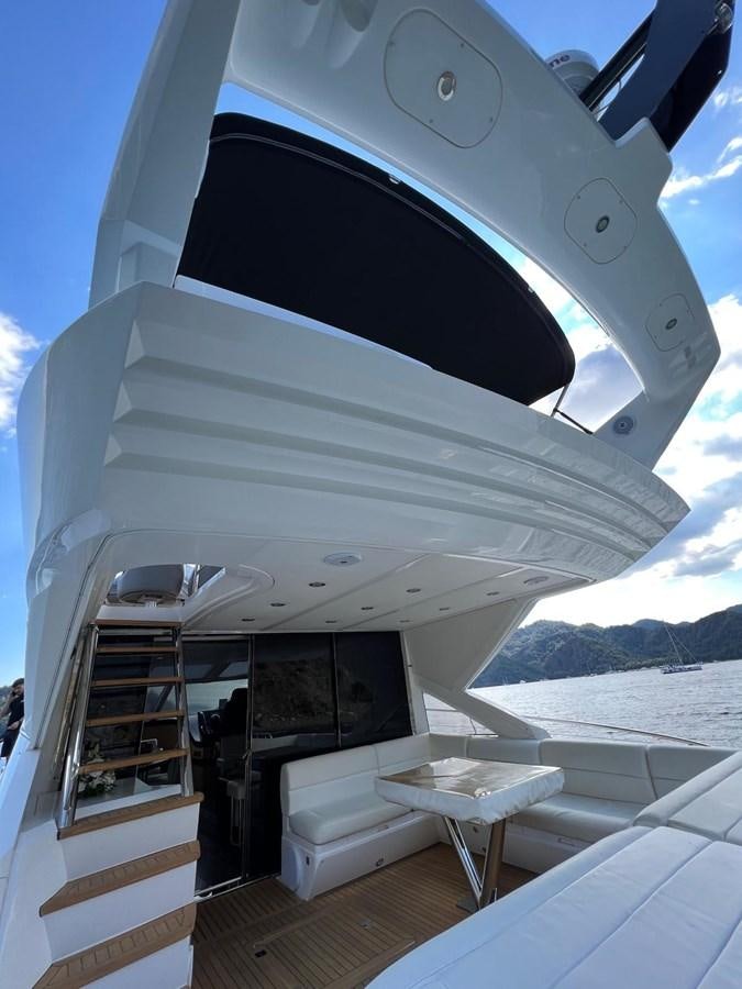 a boat with a large screen aboard ESCAPE Yacht for Sale