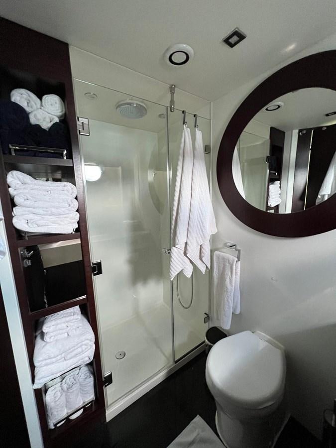 a bathroom with a shower aboard ESCAPE Yacht for Sale