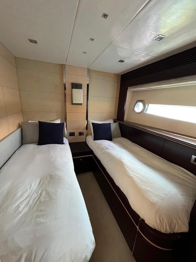 a couple of beds in a room aboard ESCAPE Yacht for Sale