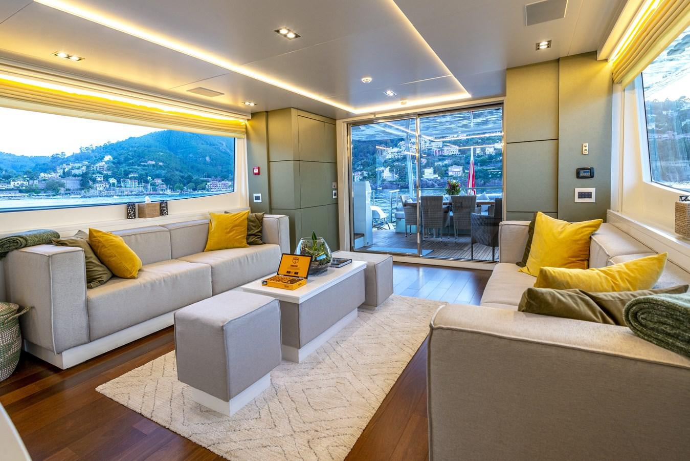a living room with a large window aboard MANATEA Yacht for Sale