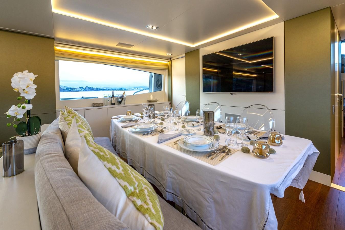 a table set for a dinner aboard MANATEA Yacht for Sale