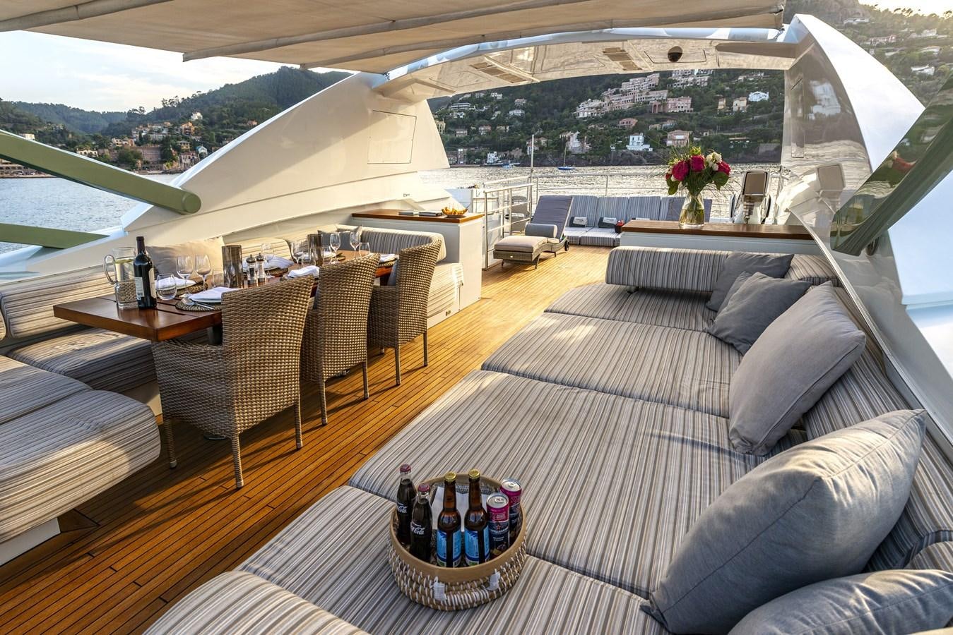 a room with a couch and chairs aboard MANATEA Yacht for Sale