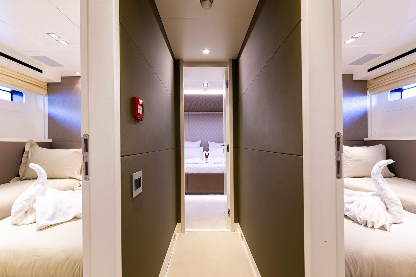 a room with a bed and a mirror aboard MANATEA Yacht for Sale