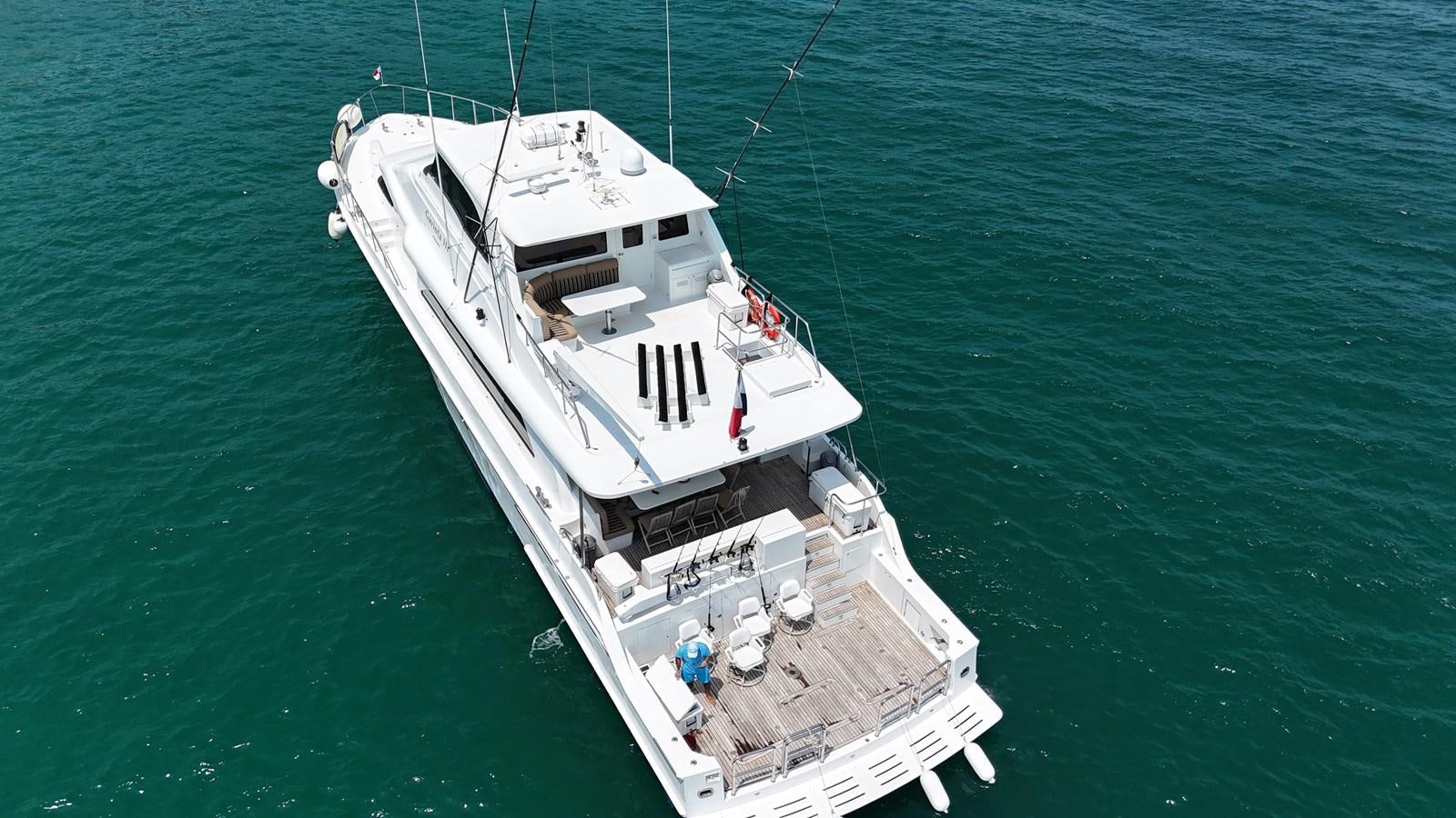 a large white boat in the water aboard GAVIOTA III Yacht for Sale