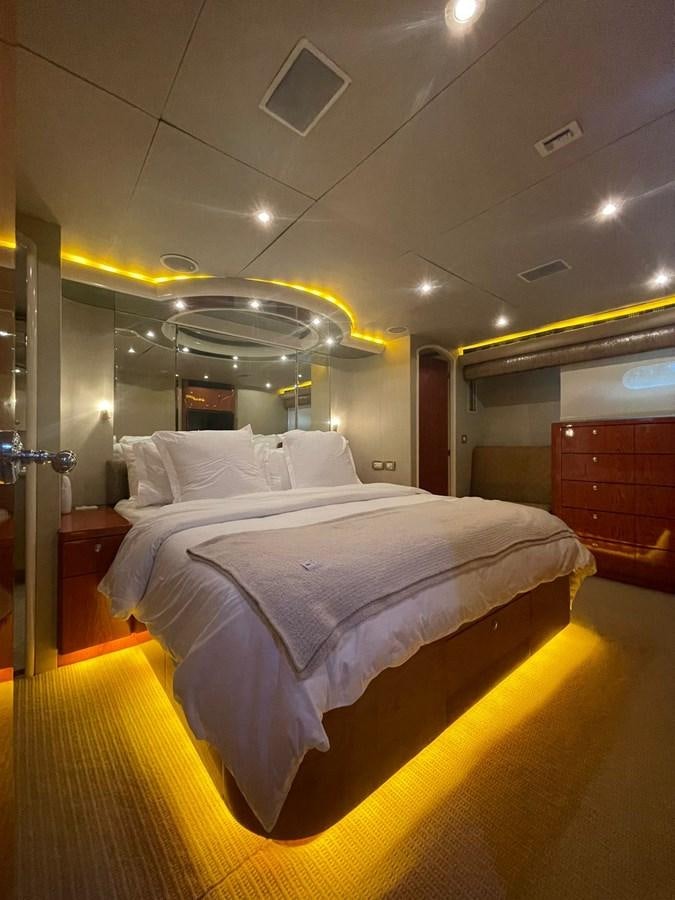 a bed in a room aboard GAVIOTA III Yacht for Sale