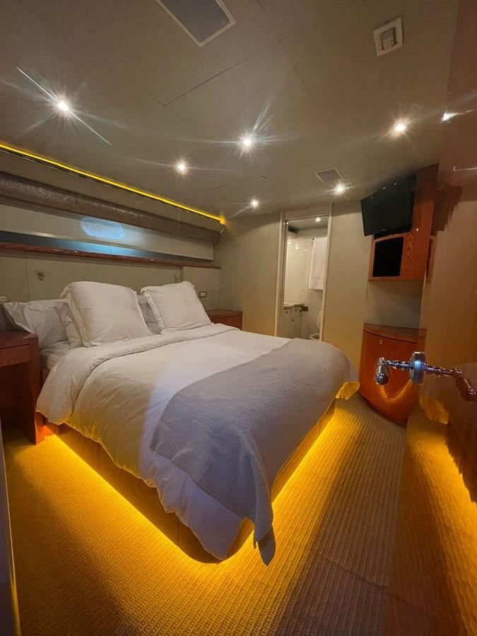 a bed in a room aboard GAVIOTA III Yacht for Sale