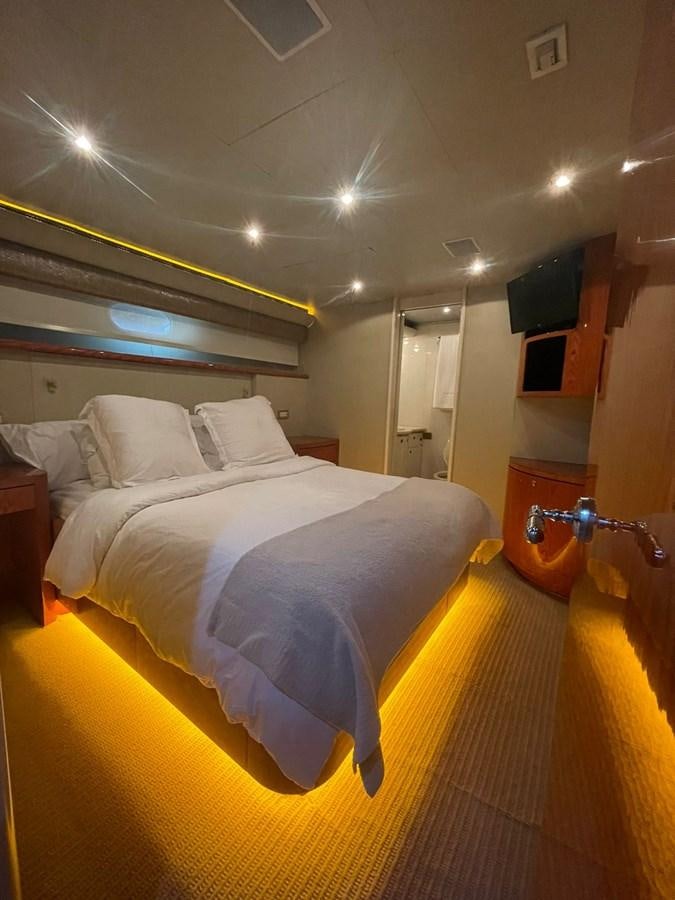 a bed in a room aboard GAVIOTA III Yacht for Sale