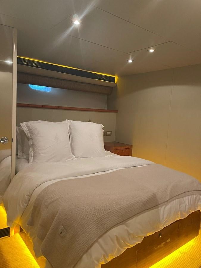 a bed with white sheets aboard GAVIOTA III Yacht for Sale