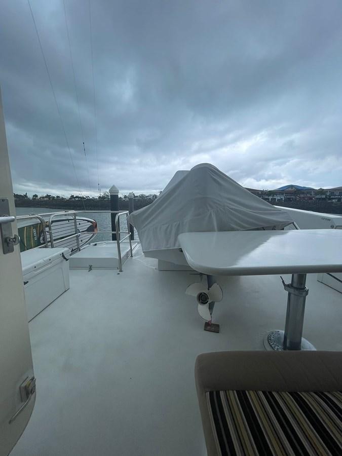 a white tent on a deck aboard GAVIOTA III Yacht for Sale