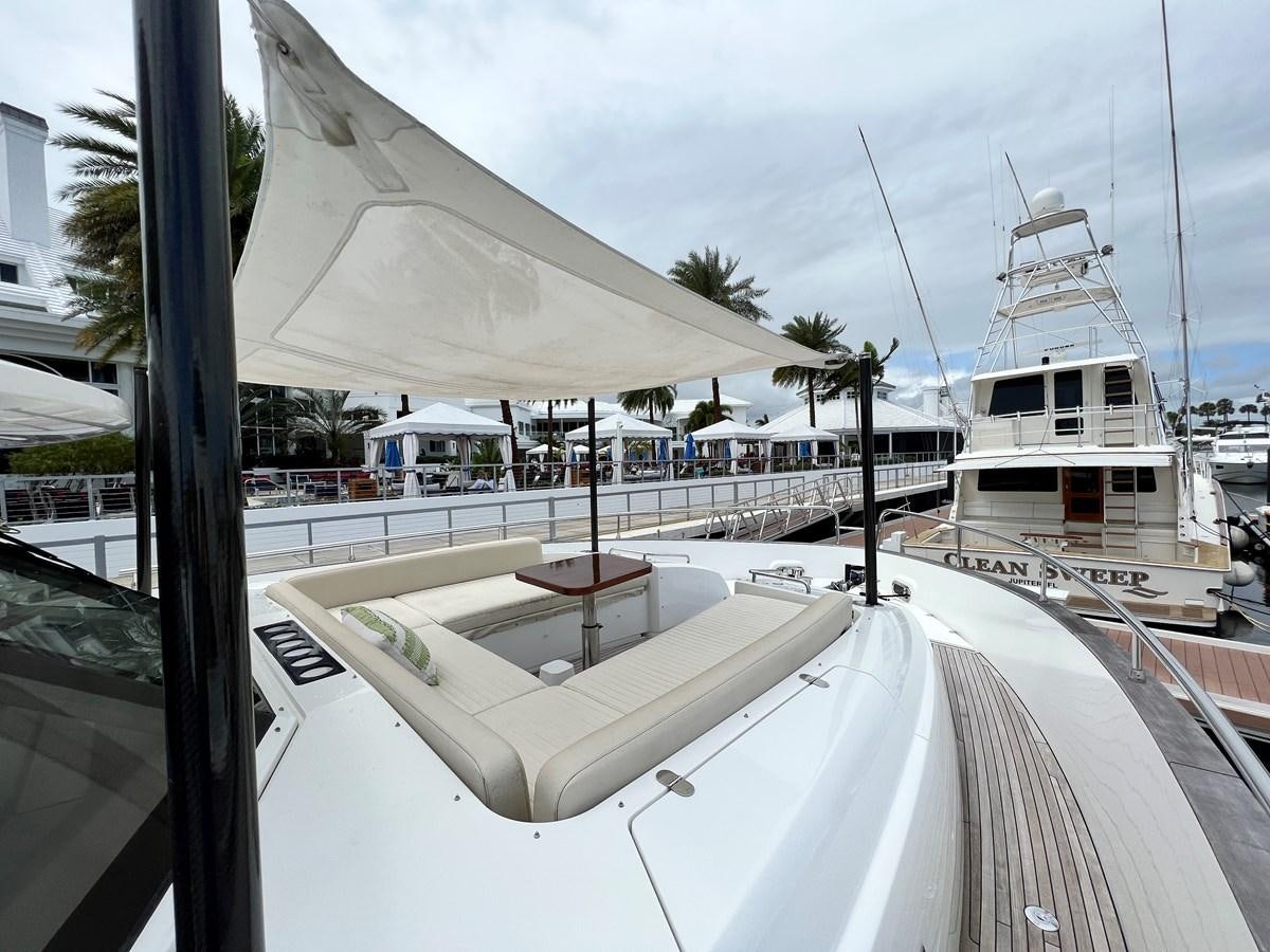 a boat on a deck aboard PURA VIDA Yacht for Sale