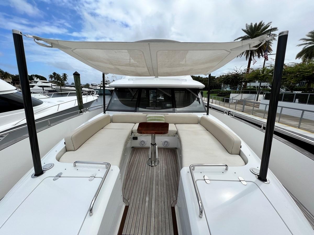 a boat on a deck aboard PURA VIDA Yacht for Sale