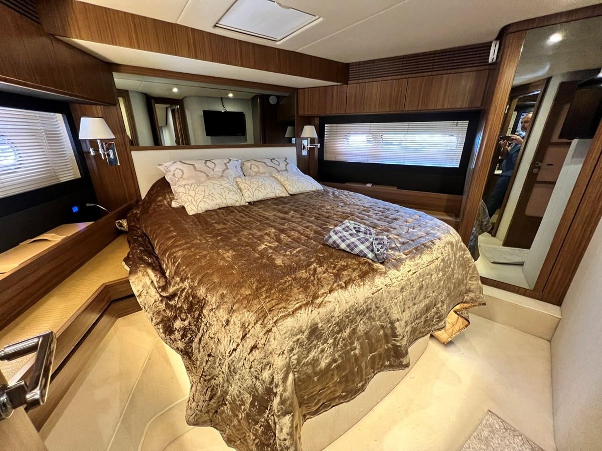a bed in a room aboard PURA VIDA Yacht for Sale