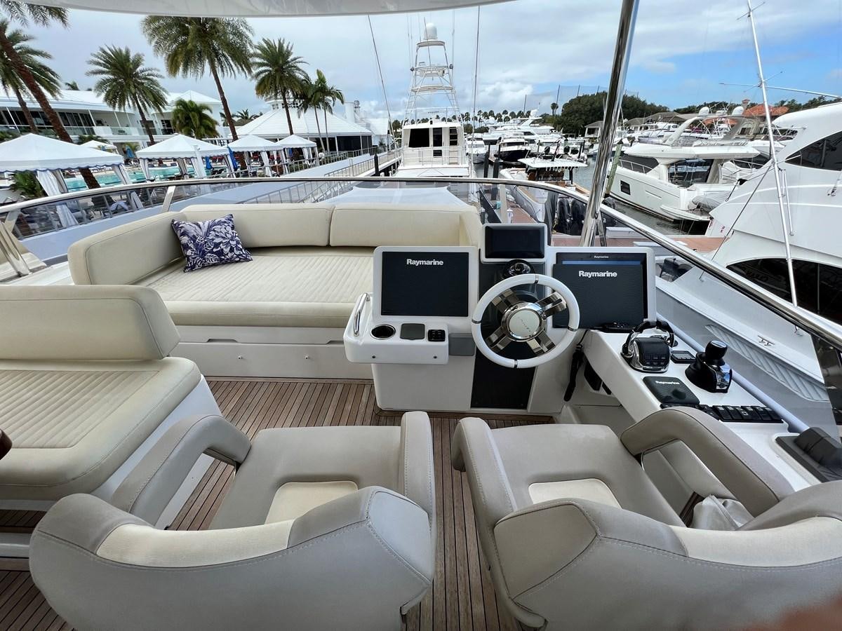 a boat with a laptop on it aboard PURA VIDA Yacht for Sale