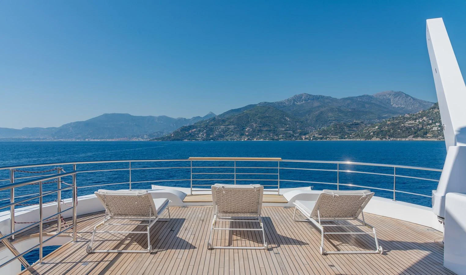 a deck overlooking a body of water aboard JOY ME Yacht for Sale