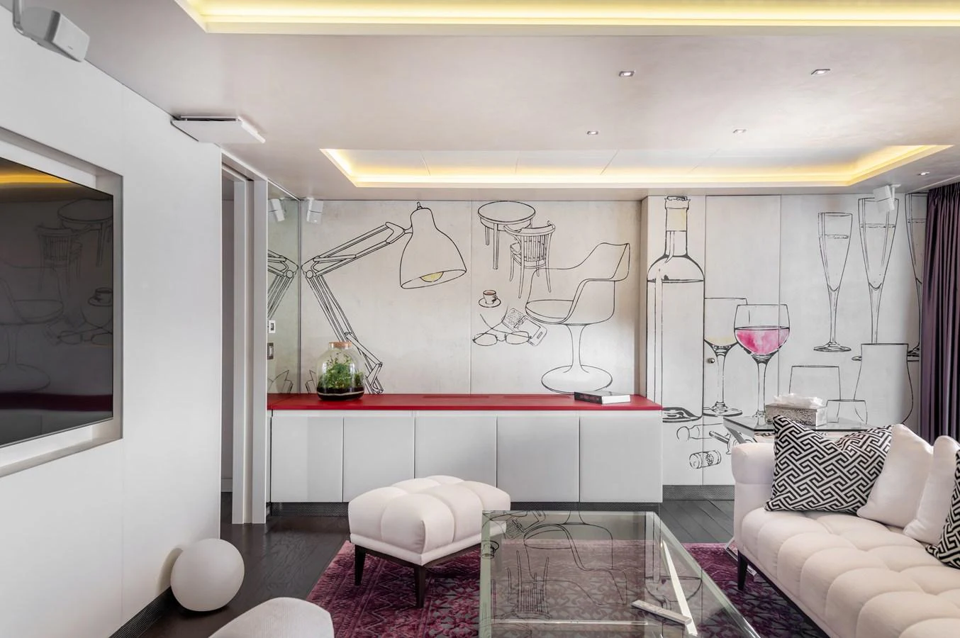 a room with a table chairs and a painting on the wall aboard JOY ME Yacht for Sale