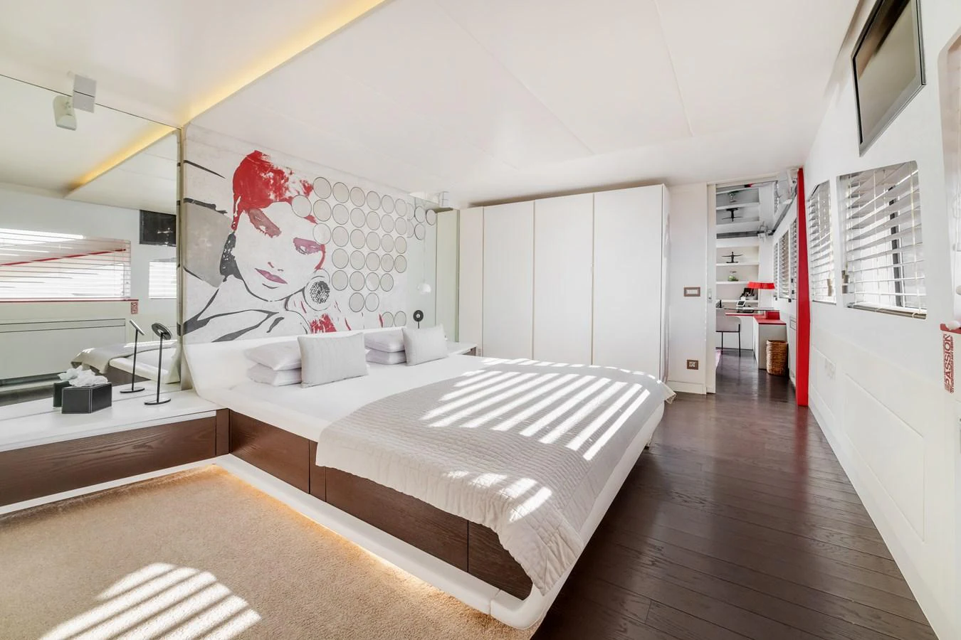 a large white bed in a room aboard JOY ME Yacht for Sale