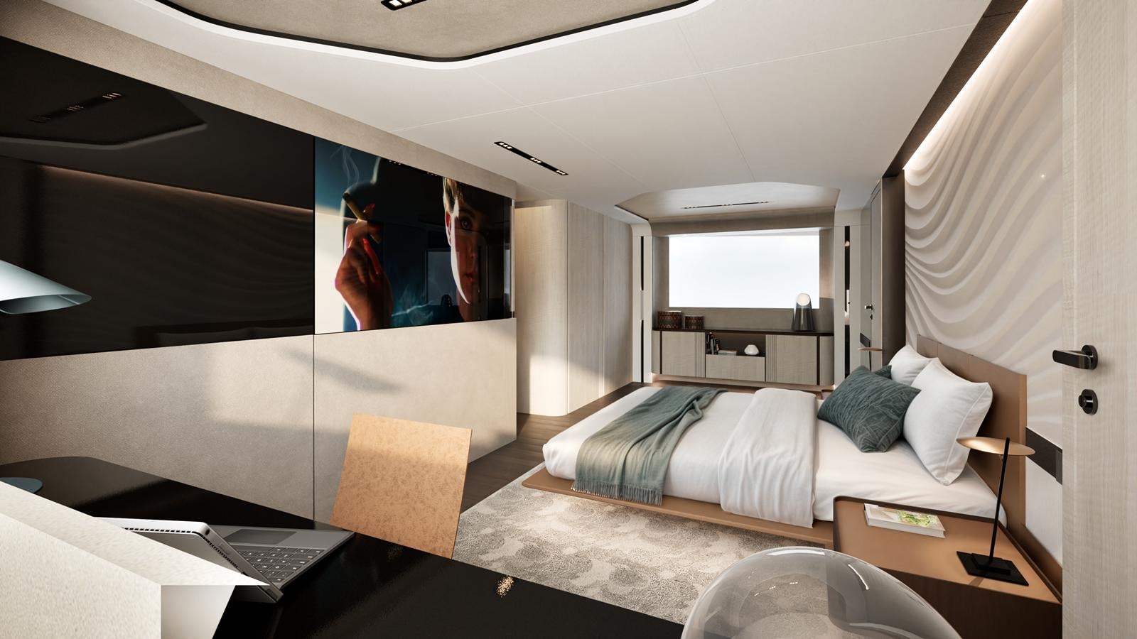 a bedroom with a bed and a desk aboard ISA VIPER 120 Yacht for Sale