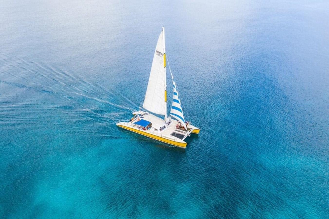 a sailboat in the ocean aboard 1996 GOLD COAST GC 70 Yacht for Sale