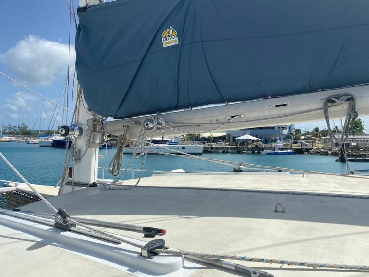 a boat docked at a pier aboard 1996 GOLD COAST GC 70 Yacht for Sale