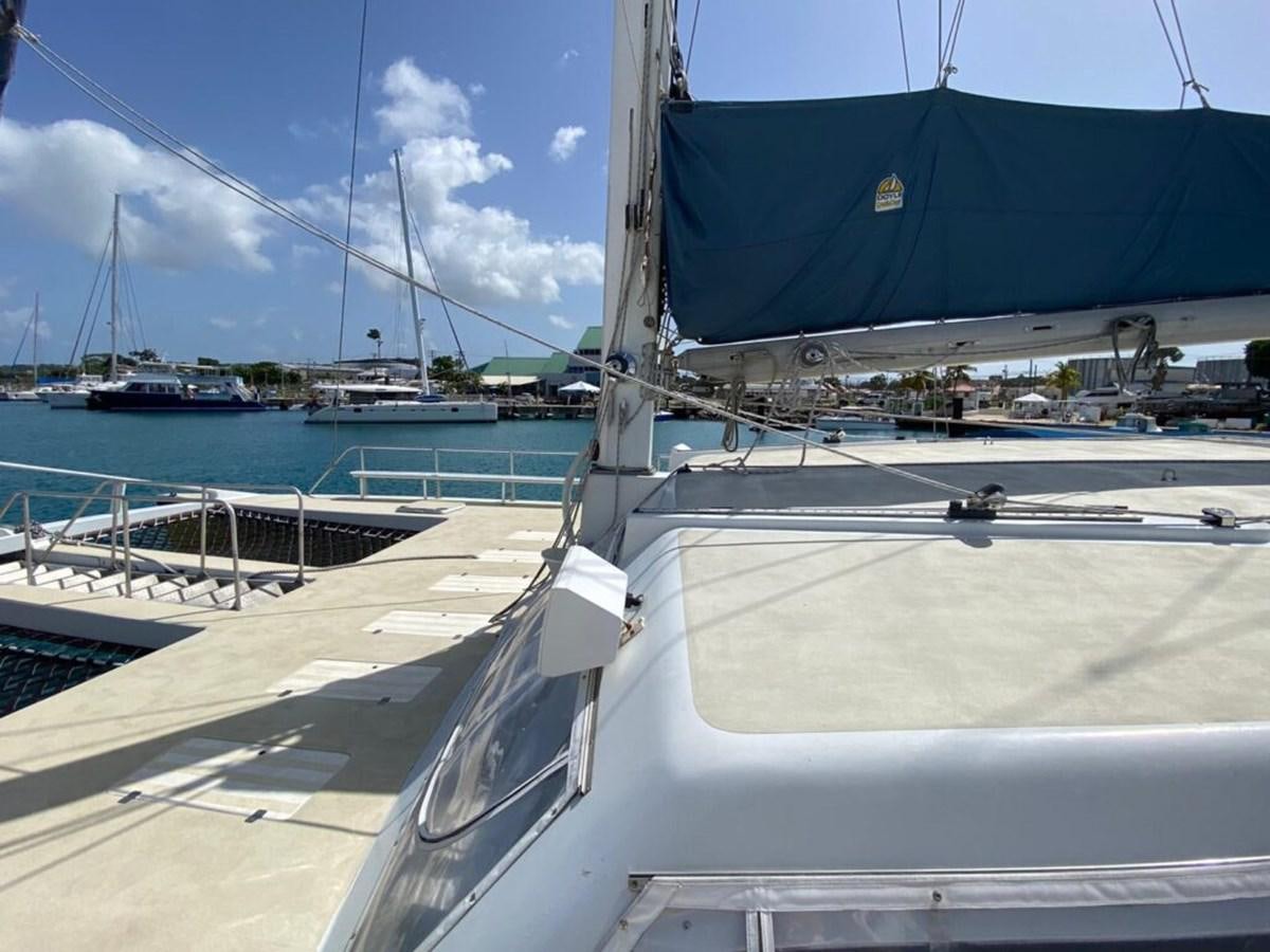 a boat docked at a pier aboard 1996 GOLD COAST GC 70 Yacht for Sale