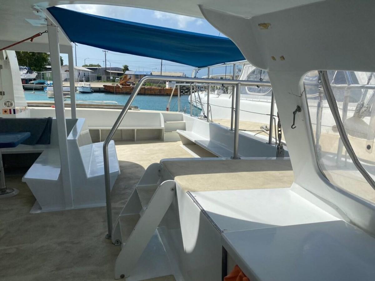 a boat with a white canopy aboard 1996 GOLD COAST GC 70 Yacht for Sale