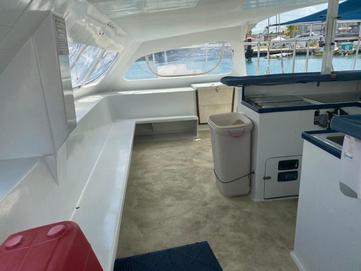 inside of a white tent aboard 1996 GOLD COAST GC 70 Yacht for Sale