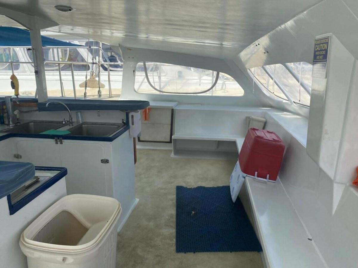 a room with a sink and a bathtub aboard 1996 GOLD COAST GC 70 Yacht for Sale
