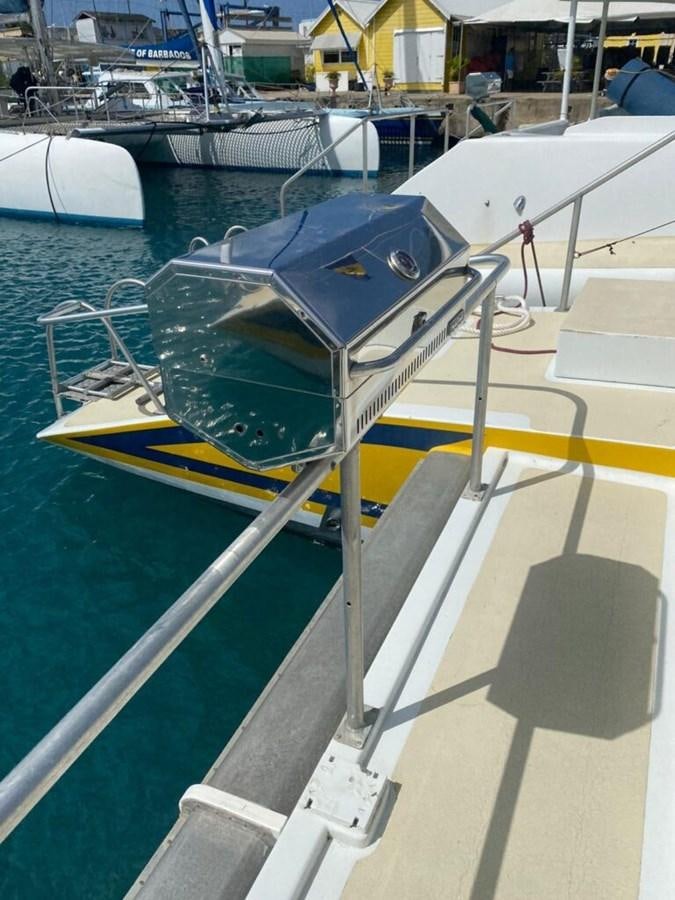 a boat on a dock aboard 1996 GOLD COAST GC 70 Yacht for Sale