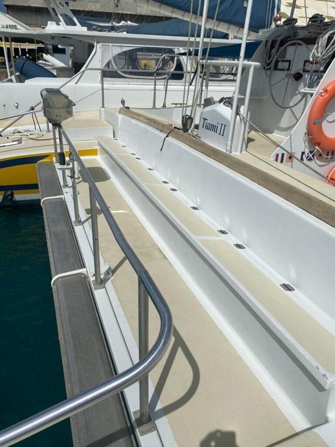 a close-up of a white boat aboard 1996 GOLD COAST GC 70 Yacht for Sale