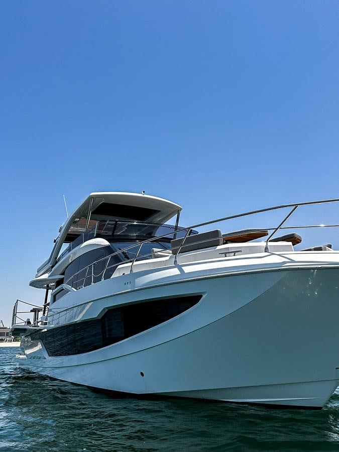 a white yacht in the water aboard JANICE Yacht for Sale