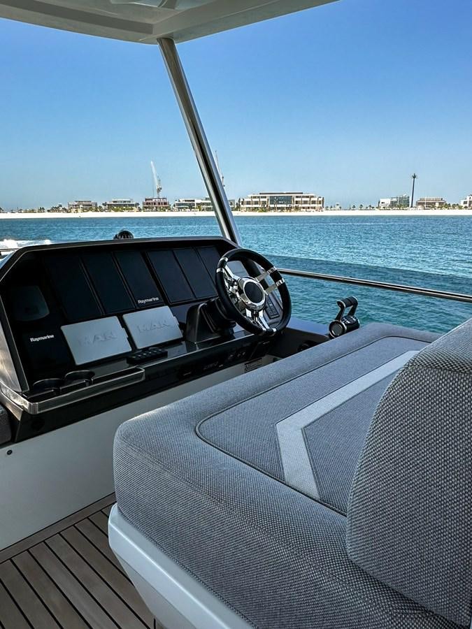 the front of a car on a boat aboard JANICE Yacht for Sale