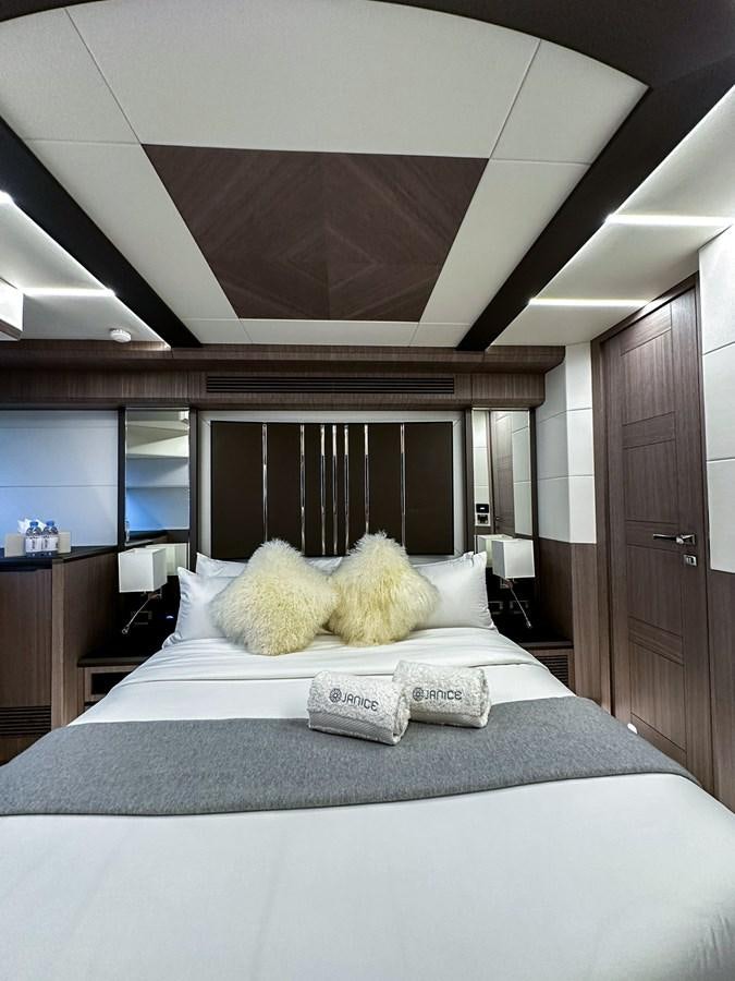 a bed with pillows aboard JANICE Yacht for Sale