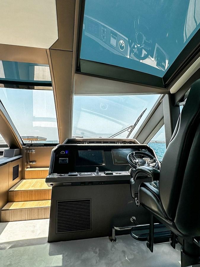 a car with a screen on the side aboard JANICE Yacht for Sale