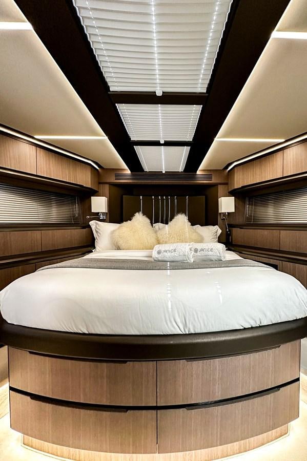 a bed with a canopy over it aboard JANICE Yacht for Sale
